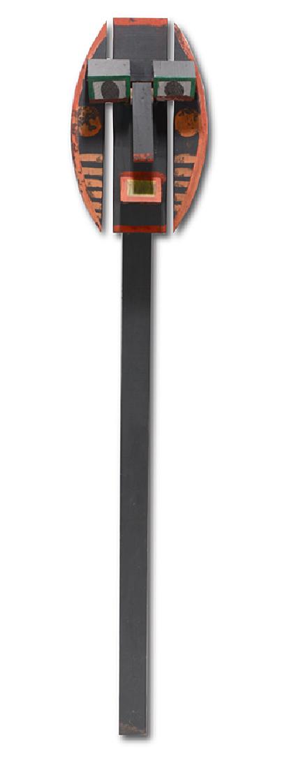 Lonnie Holley. African Mask On Post.: Lonnie Holley. African Mask On Post. Not signed. Painted wooden construction on wooden post. Excellent condition. 76" h x 16" x 4". Provenance: The Collection of Georgine and Jack Clarke. Est. $