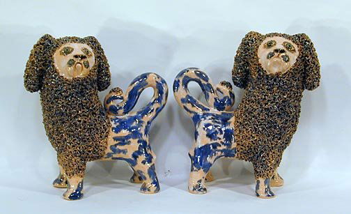 Billy Ray Hussey Bookend Dogs: 8" h x 8" L each.