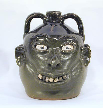 Lanier Meaders Dbl Rock Tooth: Double Face Rock Tooth Jug, early 1970's. Beautiful glaze. 7 Teeth in front. The Ultimate Lanier Meaders' piece! Museum Quality!