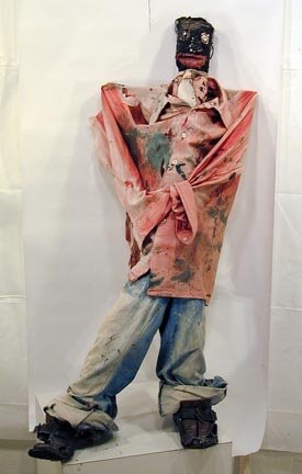 Sam Doyle Bosie Bee: Wood and cloth sculpture with leather shoes. A rare 3-dimensional piece by Sam Doyle. This piece exhibited at the Doyle Retrospective at The High Museum of Art. 20" w x 46" h.Bosie Bee was highly soug