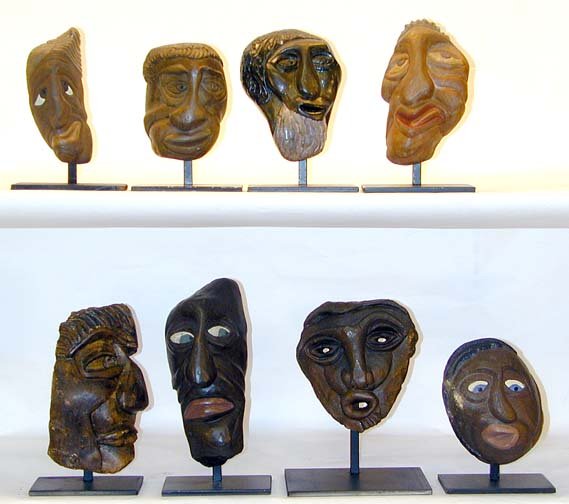 David Marshall 8 Stone Heads: Heads range in size from 4" w x 8" h for the large and 4" x 6" for the small. All have nice sturdy metal display stands. Heads may have been created by David's brother.