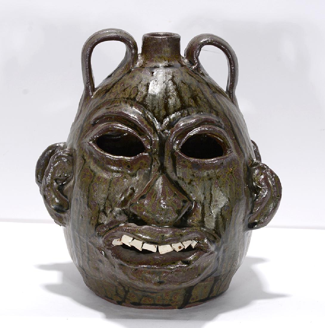 Chester Hewell. Double Face Jack O'Lantern.: Chester Hewell. Double Face Jack O'Lantern. 1999. Signed and dated. #1 of 1. This is the only one ever made. Mint condition. 11"h. Est. $400-600. Ship: $55