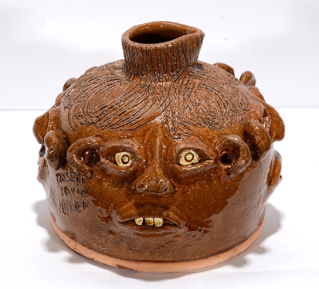 Flossie & David Meaders. Large 4 Face Buggy Jug.: Flossie & David Meaders. Large 4 Face Buggy Jug. Signed. Not dated. Mint condition. 9.5" h x 11" diameter. Est. $300-500. Ship: $55