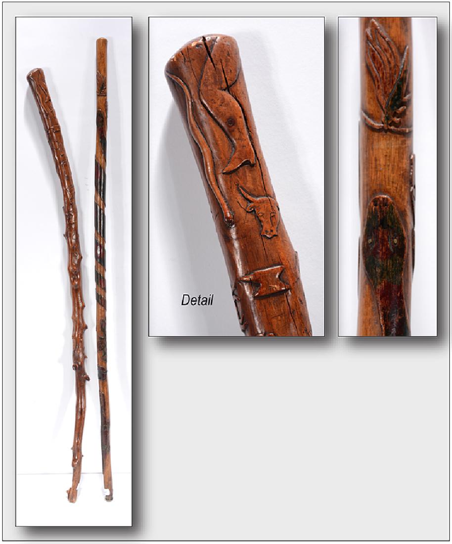 Early Carved Canes With Figure & Animal Relief.: Early Carved Canes With Figure & Animal Relief. c. 1880. Not signed. One is dated. Both are carved and varnished wood. Great condition. Tallest is 36"h. Provenance: The Ames Gallery. Est. $800-1,200. 
