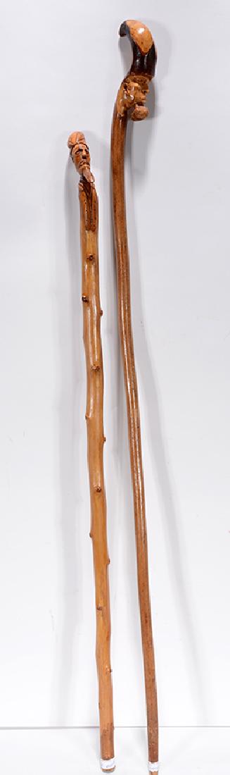 Pair of Beaded Man Walking Canes.: Pair of Beaded Man Walking Canes. c. early 1900's. Not signed or dated. Carved wood. Great condition. Tallest is 36"h. Provenance: The Ames Gallery. Est. $200-400. Ship: $55