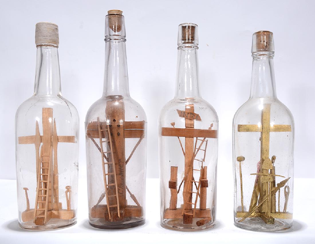 Crucifixion Scenes Inside Bottles Whimseys.: ﻿Four Bottle Whimseys. Crucifixion Scenes Inside Bottles. c. 1915. Some are signed and dated. All are carved natural wood. All in great condition. Average size is 11” h. Provenance: The A