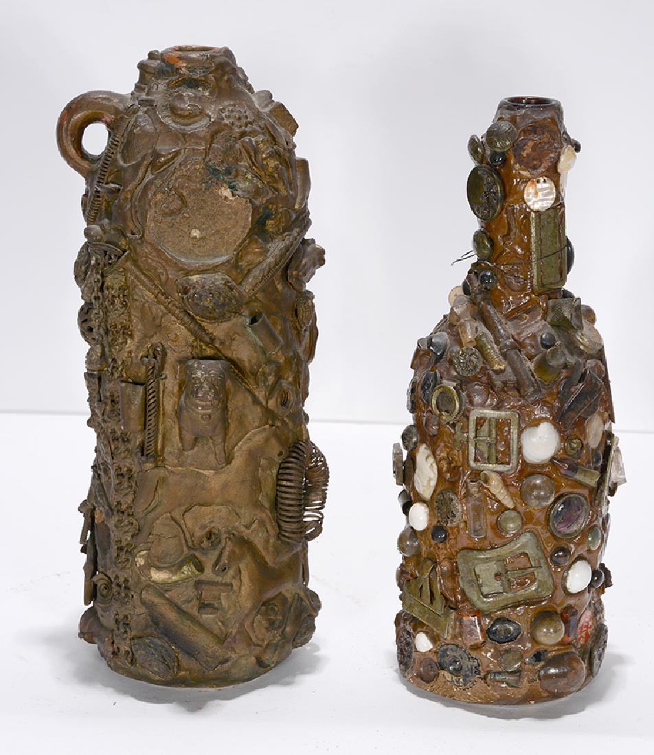 Pair of Wine Bottle Memory Jugs.: Pair of Wine Bottle Memory Jugs. Not signed or dated. Heavily decorated wine bottles with very minor loss, otherwise great condition. Average size is 12” h. Provenance: The Ames Gallery. E