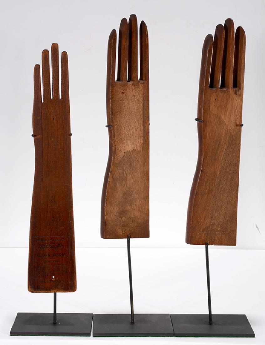 Wisconsin Textile & Truefit. 3 Wooden Glove: ﻿Wisconsin Textile & M.R. Truefit. 3 Wooden Glove Molds. Stamped. Great condition. Average size with stand is 18” h. Est. $200-300. Ship: $45