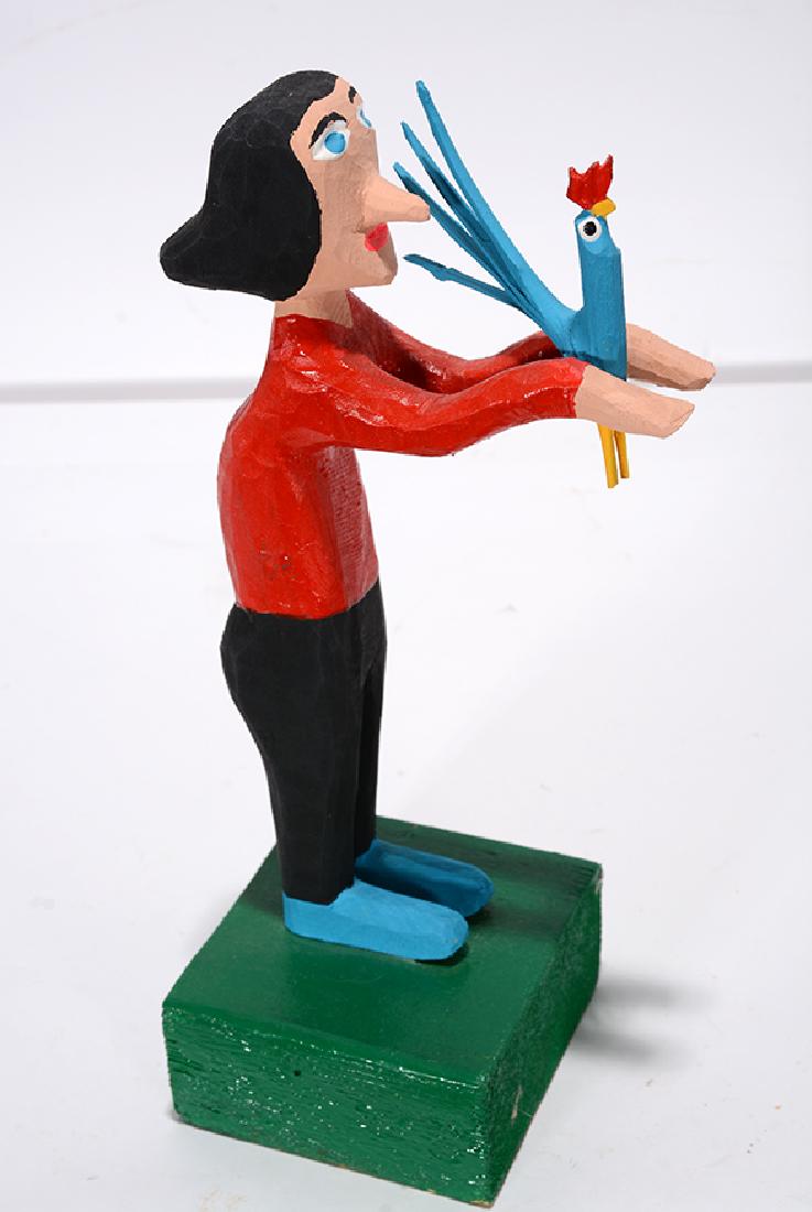 Minnie Adkins. Self-Portrait With Rooster.: ﻿Minnie Adkins. Self-Portrait With Rooster. 2007. Signed and dated. Carved and painted wood. Excellent condition. 9.5” h. Est. $200-300. Ship: $35