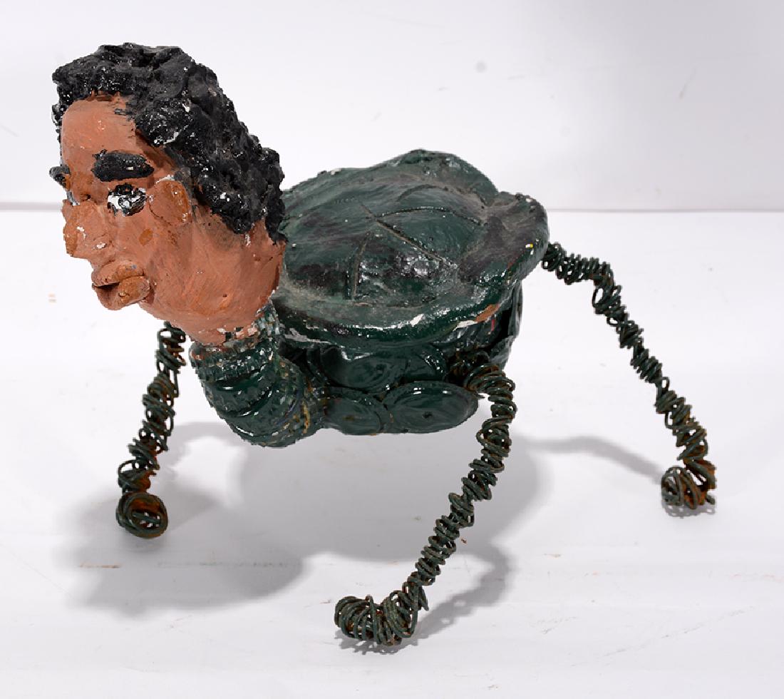 Mr. Imagination. Turtle Man.: ﻿Mr. Imagination. Turtle Man. Not signed. Wire, plaster, bottlecap, paint construction. Some wear on hair, otherwise good condition. 8” x 6” x 6”. Est. $200-300. Ship: $35