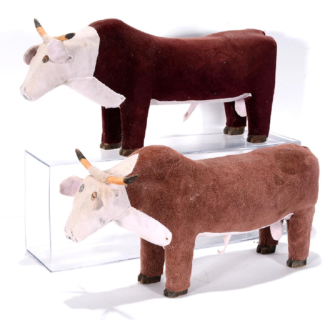 Dan Hot. Pair Of Velvet & Felt Bulls.: ﻿Dan Hot. Pair Of Velvet & Felt Bulls. Not signed. Carved wood, covered in velvet felt. Excellent condition. Each is 16” long. Est. $300-500. Ship: $65