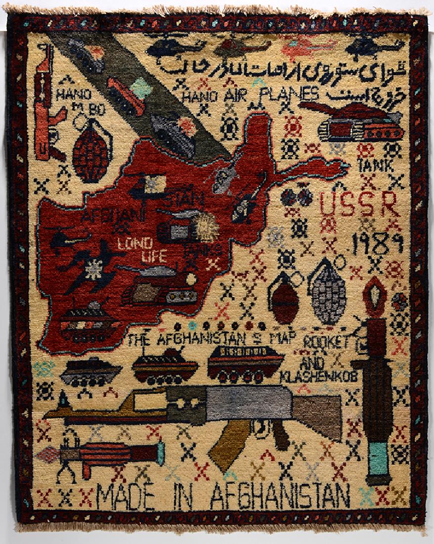 Afghan War Rug. USSR Withdrawal.: ﻿Afghan War Rug. USSR Withdrawal. 1989. Titled and dated. Hand-woven wool rug with map and weapons depicting Soviet Occupation. Excellent condition 24” w x 30” h. Est. $300-50