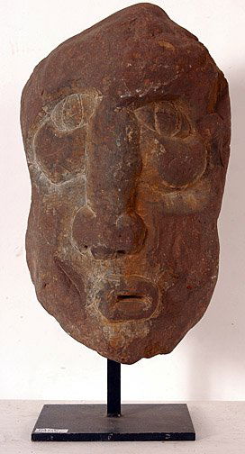 David Marshall Stone Head.: Carved stone mouted on display base. 11" x 5.5" x 6". Est. $800 - $1,200. Ship: $40