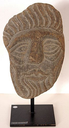 David Marshall Stone Head with Beard.: c. 1989. Carved stone mounted on base. 12.5"h x 6.5"w. Est. $800 - $1,200. Ship: $40