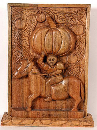 Everald Brown - Jamaican Mysteries.: c. 1993. Carved bas-relief wood plaque. 13 x 19" x 2". Provenance: Jonathan Demme Collection. Est. $800 - $1,200. Ship: $25"
