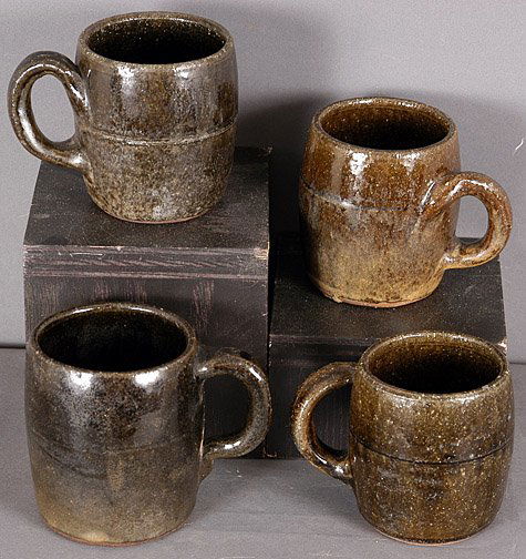 Lanier Meaders Four Coffee Mugs: Four Coffee Mugs. c. 1970's. Ash glaze. Average size is 4" h. Excellent to mint condition. Est. $200 - $300. Ship: $35