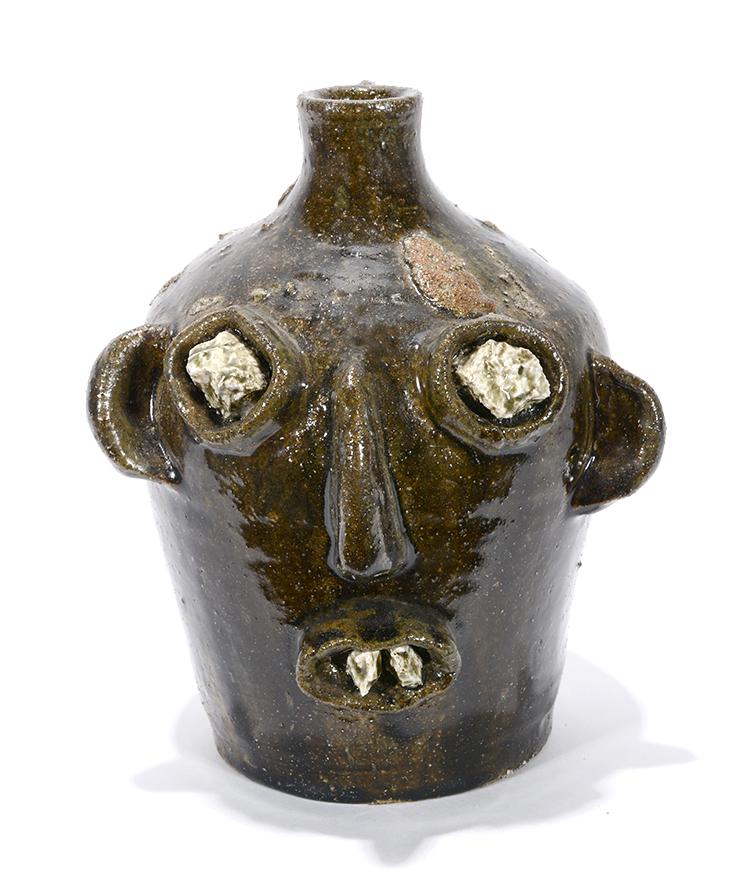 Clint Alderman. Tribute To Cheever Meaders Face Jug.: Clint Alderman. A Tribute To The Great Cheever Meaders Face Jug. 2002. #1 of 15. Signed, dated and numbered. Stone eyes and teeth with ash glaze. Excellent condition. 10"h. Est.$200-400. Ship:$45