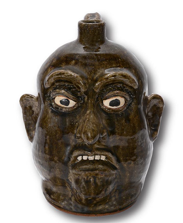 Lanier Meaders. Large Chin Face Jug.: Lanier Meaders. Large Chin Face Jug. c. 1970s. Glassy glaze. Mint condition. 10.5"h. Est.$800-1,200. Ship:$45