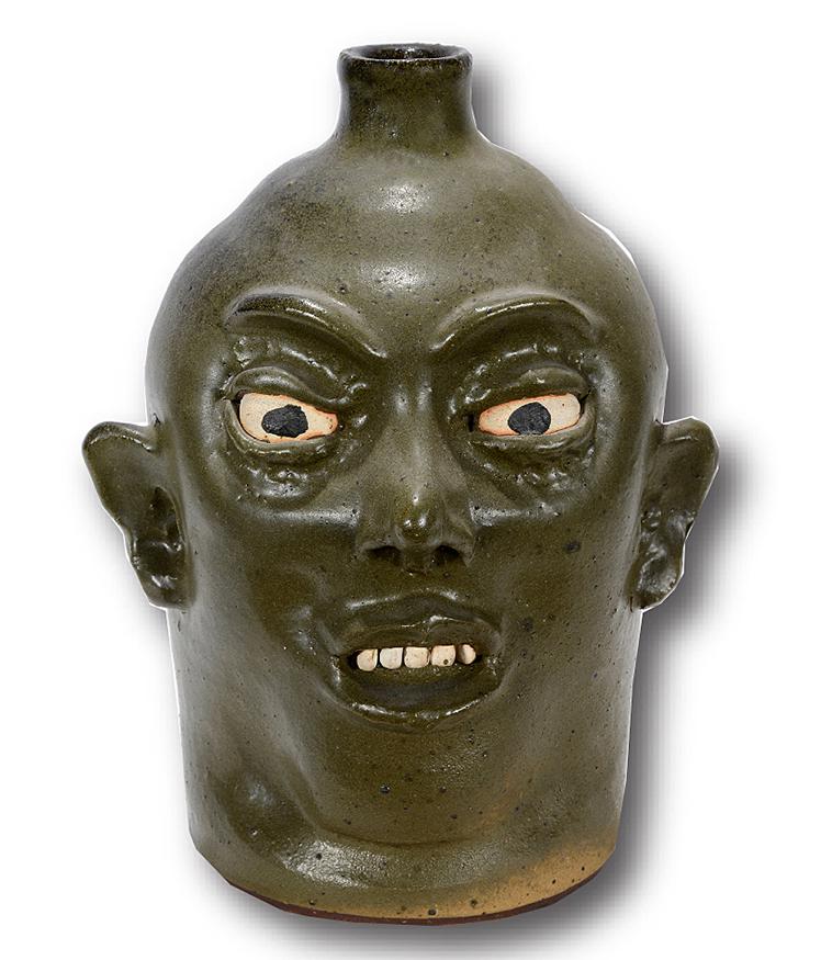 Lanier Meaders. Face Jug.: Lanier Meaders. Face Jug. c. 1970s. Signed. Matt glaze. Mint condition. 10"h. Est.$700-900. Ship:$55