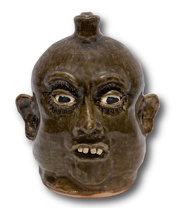 Lanier Meaders. 4 Tooth Black Eyed Face Jug.: Lanier Meaders. Four Tooth Slack Jaw Black Eyed Face Jug. c. early 1980s. Signed. Mint condition. 9.5"h. Est.$800-1,200. Ship:$55