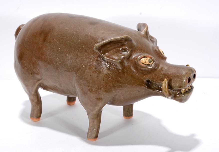 Reggie Meaders. Wart Hog, #1.: Reggie Meaders. Wart Hog, #1. Signed and numbered. Mint condition. 13" long x 7"h. Est.$400-600. Ship:$45
