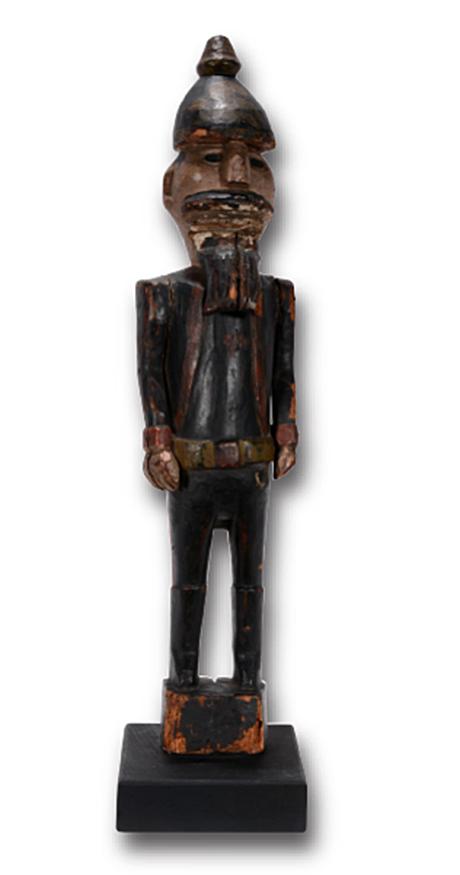 Wooden Soldier, Possibly Hessian Mercenary.: Wooden Soldier, Possibly Hessian Mercenary. c. late 18th or early 19th century (Revolutionary War or War of 1812 era). Carved wood, gesso, plaster and paint. Figure is 22"h, mounted on modern base it