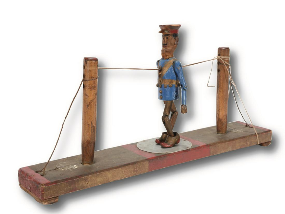 Dancing Policeman Limberjack.: Dancing Policeman Limberjack. c. 1900-20. Signed, but difficult to read. Carved and painted wood with mixed media. Chip on hat, otherwise great condition. 20" x 10" x 4". Est.$800-1,200. Ship:$45