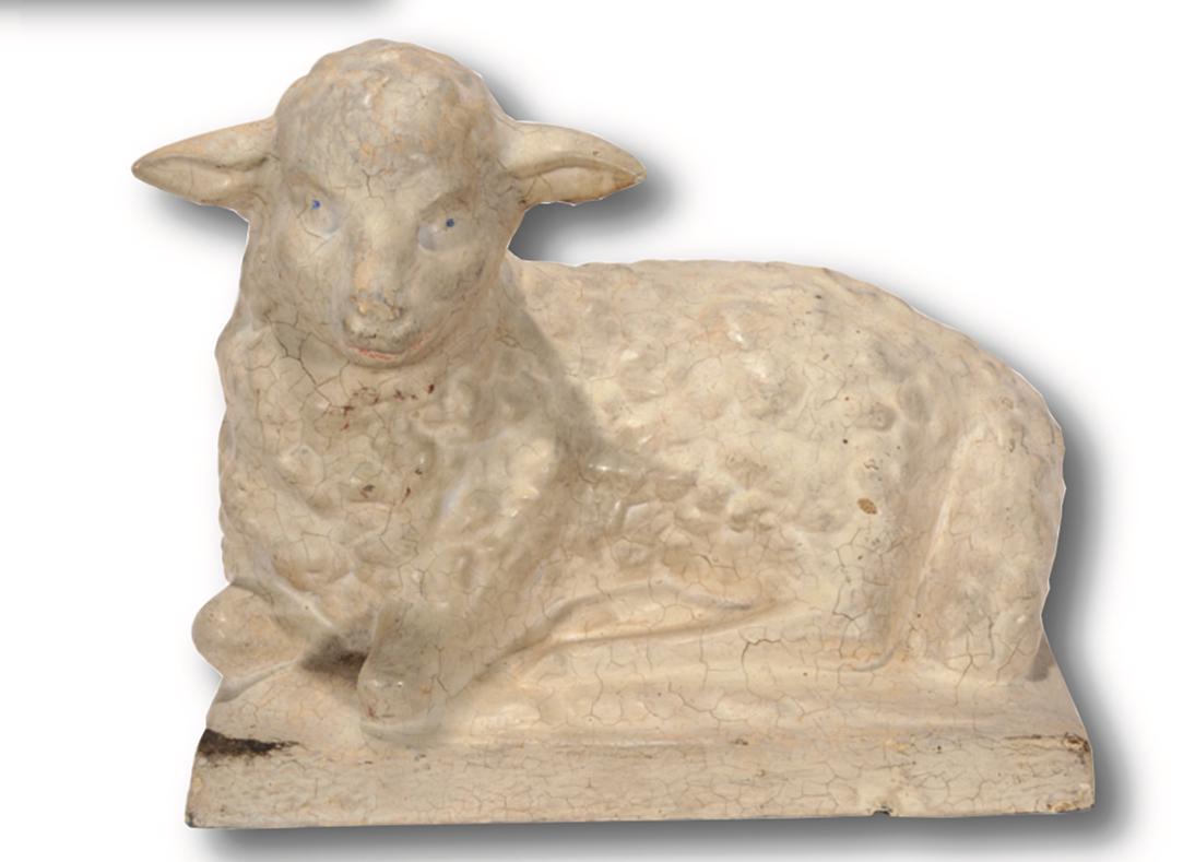 Painted Lamb Zinc Child's Grave Marker.: Painted Zinc Child's Grave Marker Reclining Lamb. Second half of the 19th c. 8.5" h x 11" x 7". Formed of six irregular cast sections of zinc that were then fused together from the underside and reinf