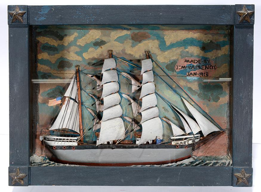 Jim Vamenos. American Sailing Ship Diorama.: Jim Vamenos. American Sailing Ship Diorama. 1913. Signed and dated. Mixed media, carved and painted wood inside shadow box. Excellent condition. 24” x 18” x 5.5”. Est. $500-800