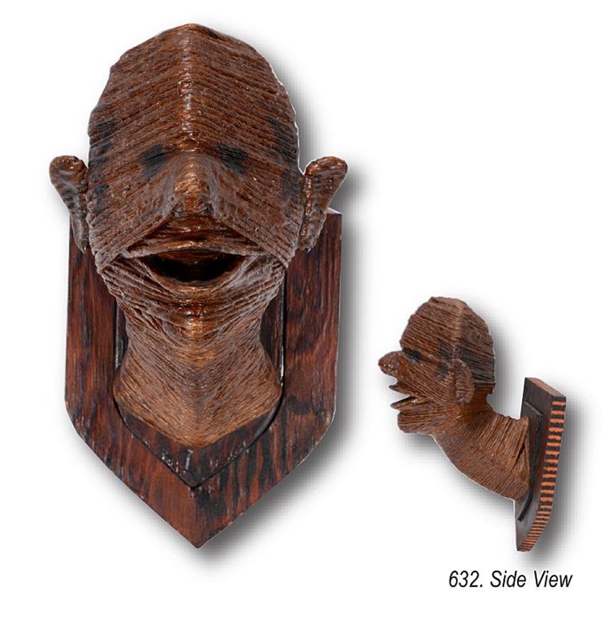 Mr. Twinehead - He’s A Trophy.: Anonymous Mr. Twinehead - He’s A Trophy. c. mid 20th century. Sculptured figure of a man’s head and neck mounted as a wall trophy; wood core wrapped with multiple layers of heavy twine or 