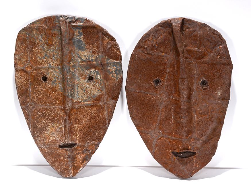 Jerry Coker. Pair of Faces.: Jerry Coker. Pair of Faces. Signed and titled on verso. Weathered metal over wood. Excellent condition. Average size is 10” x 15”. Est. $400-600. Ship:$45