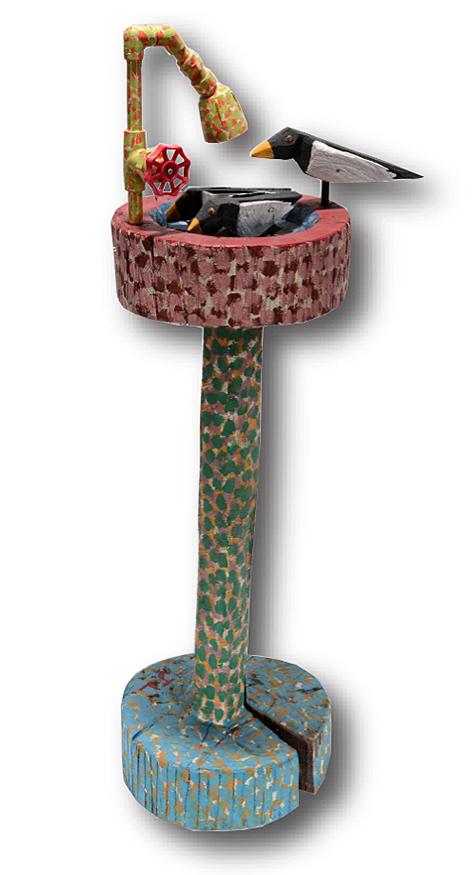 J.L. Nipper. Bird Bath.: J.L. Nipper. Bird Bath. Initialed. Paint on carved cedar wood with mixed media. Natural wood split in base, otherwise great condition. 39” h x 11” diameter. Est. $300-500. Ship