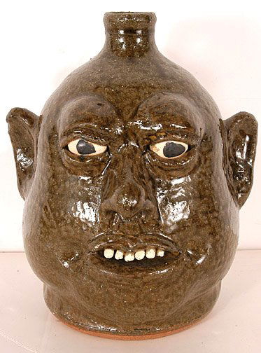 Lanier Meaders. Face Jug: c. late 1970's. 9" h. Mint condition. Est. $1,000 - $2,000. Ship: $40