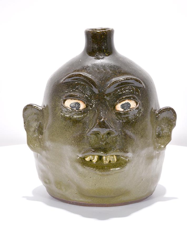 Lanier Meaders. Face Jug.: Lanier Meaders. Face Jug. c. 1970's - 80's. Signed. Not dated. Clay teeth. Mint condition. 8.5" h. Est. $700-900. Ship: $35