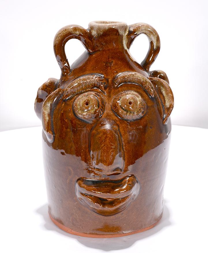 Louis Brown & Wife. Two Faced Jug. (1 of 4)