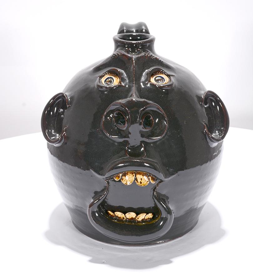 Roger Corn. Black Canon Ball Face Jug. (1 of 3)