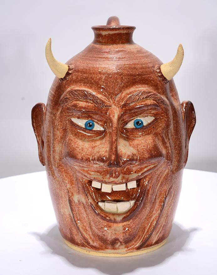 Sanona. Smiling Devil Face Jug. (1 of 4)