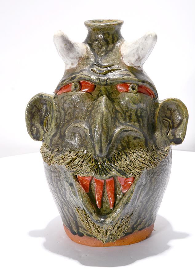 Brian Wilson. Devil Face Jug w Red Teeth.: Brian Wilson. Devil Face Jug With Red Teeth. 1999. Signed and dated. Mint condition. 9.5" h. Est. $100-200. Ship: $35