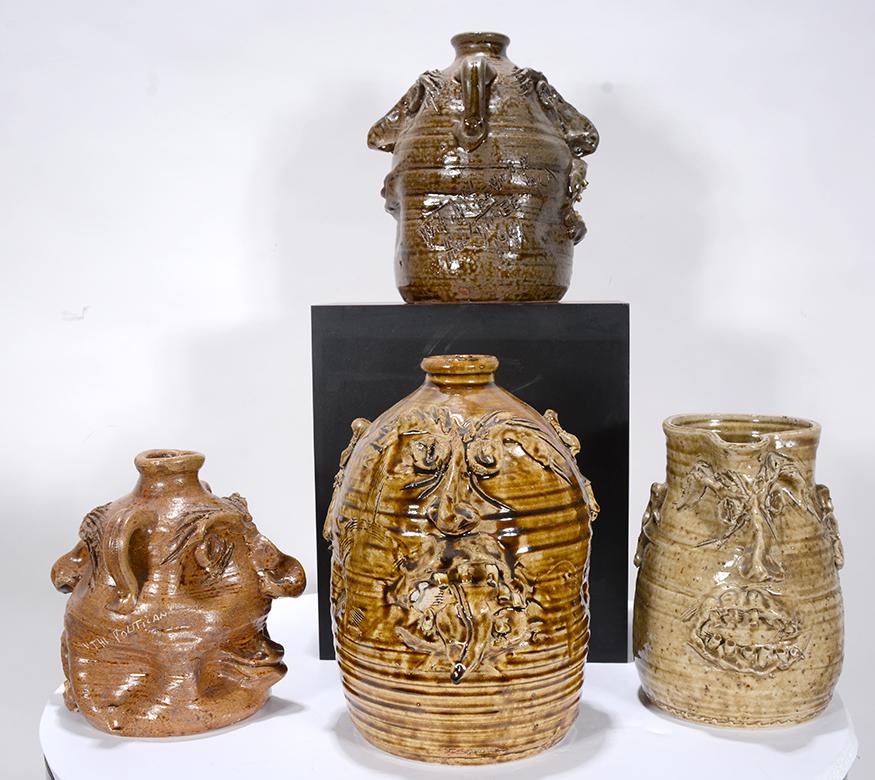 W.T. McLennan. 4 Face Jugs & Pitcher. (1 of 2)