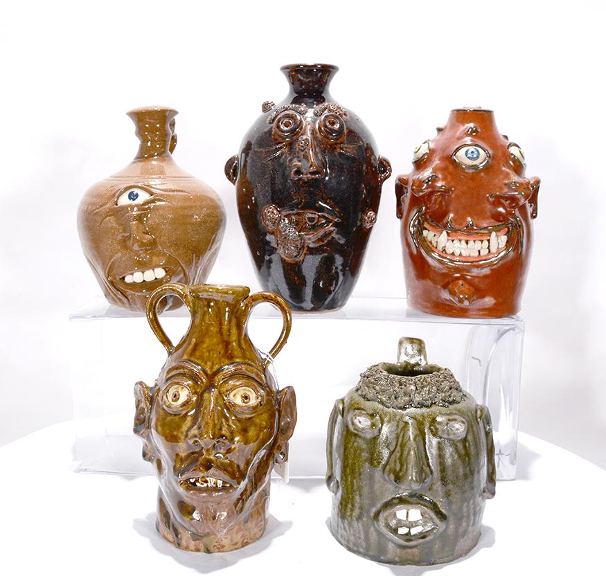 Five Strange Eyed Face Jugs. (1 of 1)