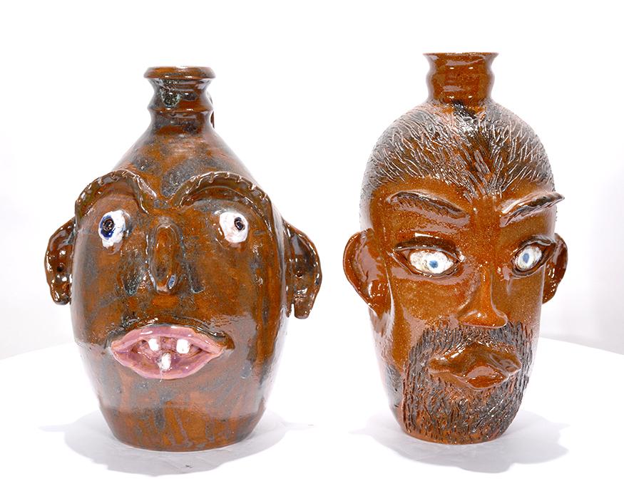 Cole Pottery. Pair of Face Jugs. (1 of 3)