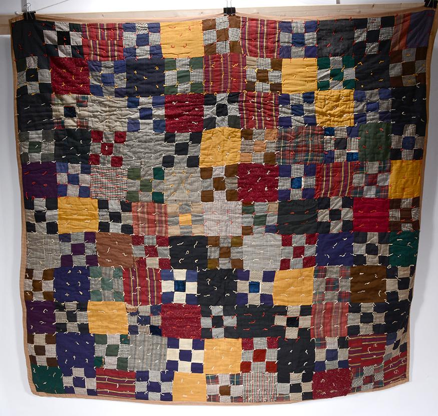 Multi-Colored Checked Board Quilt. (1 of 4)