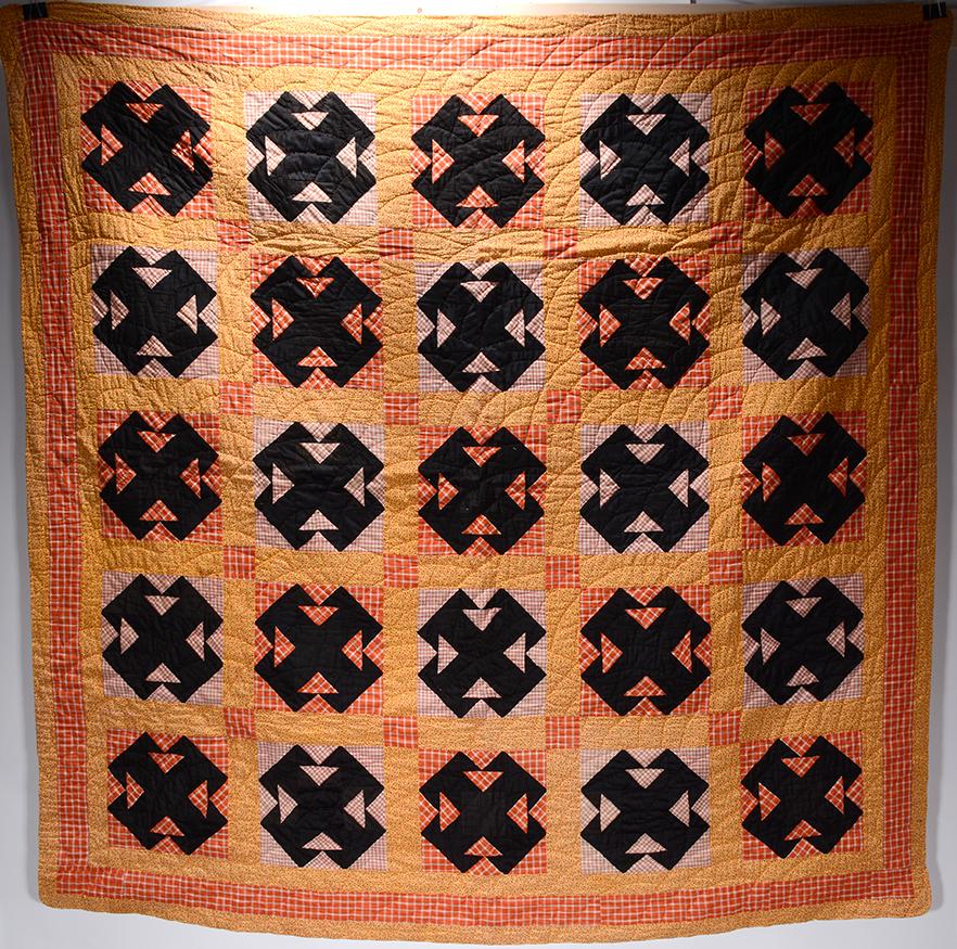 Yarn Wheel Cross Pattern Quilt. (1 of 3)