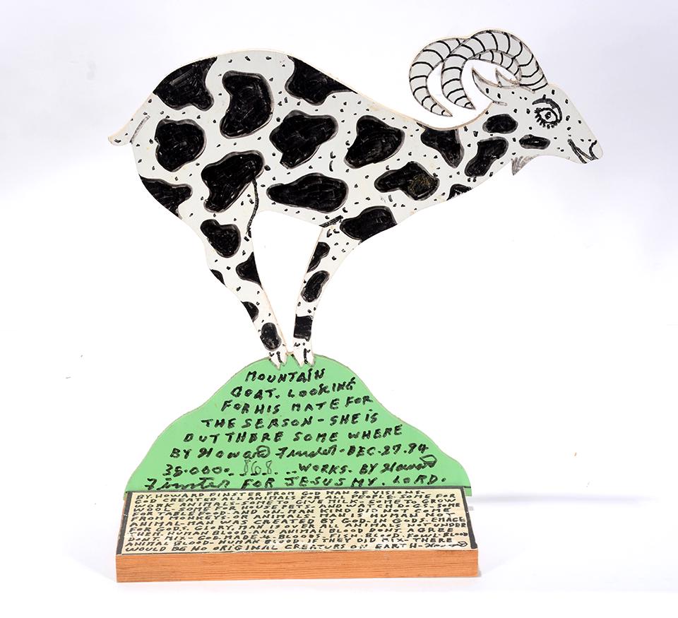 Howard Finster. Mountain Goat.: Howard Finster. Mountain Goat. 1994. #35,868. Signed, dated, titled and numbered. Paint and marker on cut out wood with paper label. Great condition. 12" x 12" x 4". Est. $200-400. Ship: $45