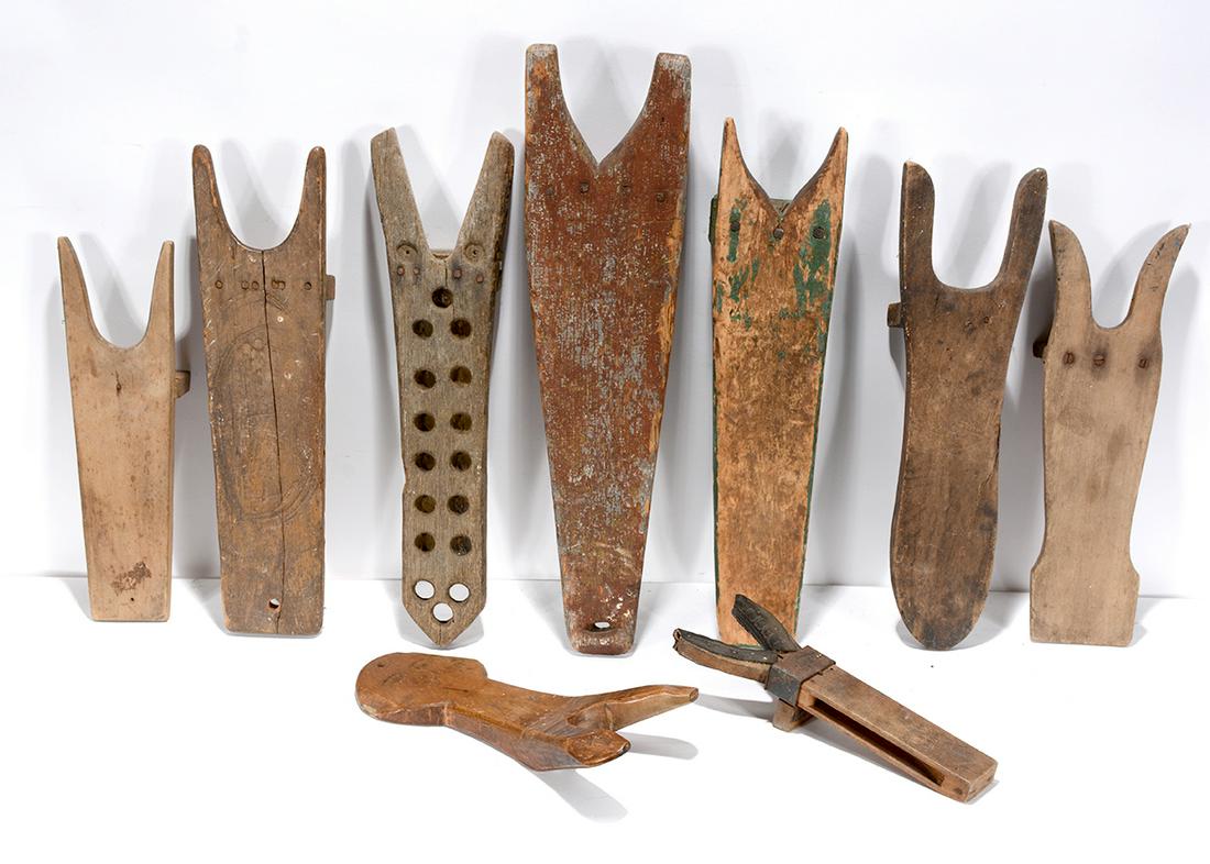 Nine Wooden Boot Jacks. (1 of 2)