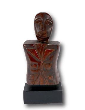 Af. Am. Carving Of A Man In A Jacket. (1 of 5)