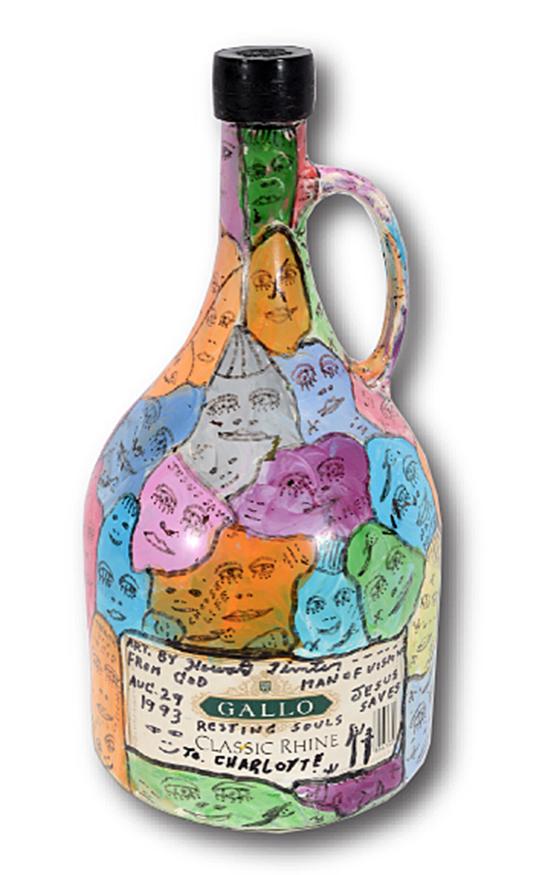 Howard Finster. Gallo Wine Bottle.: Howard Finster. Gallo Wine Bottle. 1993. #30,667. Signed, dated and numbered. Paint and marker on glass wine bottle. Some fading, otherwise good condition. 13" h. Est. $300-600. Ship: $35