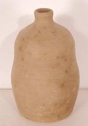 Lanier Meaders, Blank Face Jug.: Unfired ceramic. 9.5"h. Est. $100-300. Ship: $40