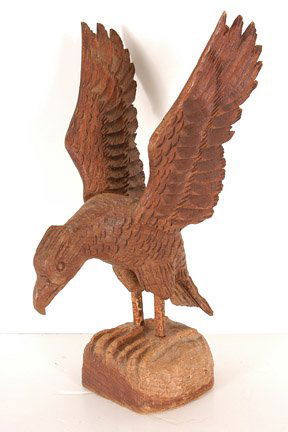 Clarence Stringfield, Eagle.: Carved wood. Not signed or dated. Slight wear to some wing tips. 6" x 13" x 9". Legs are made to fit into birds body and then into the feet. No signature. Est. $800-1,200. Ship: $40