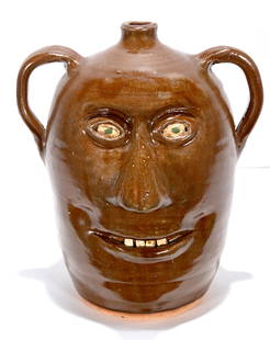 Reggie Meaders. Large Double Face Jug.: Reggie Meaders (1919-2009)Large Double Face Jug.Signed. Not dated.Mint condition.11” h.Est. $500-800. Ship: $65